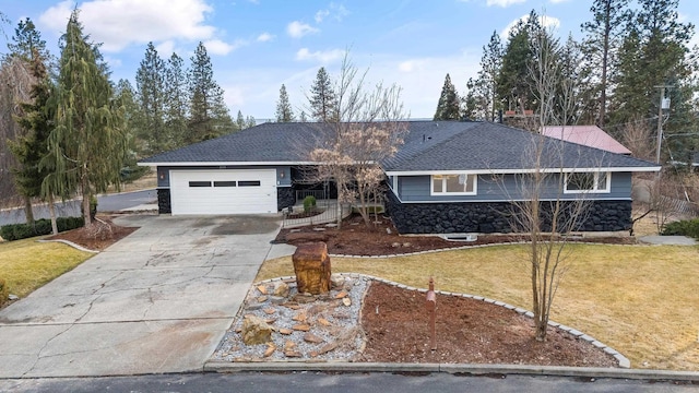 single story home with roof with shingles, a front yard, a garage, stone siding, and driveway