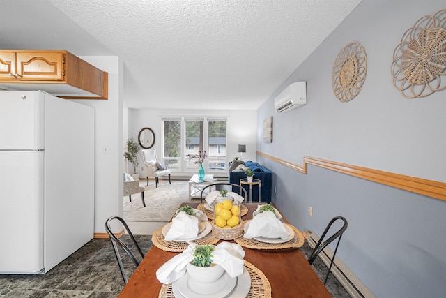 dining area featuring a textured ceiling and an AC wall unit