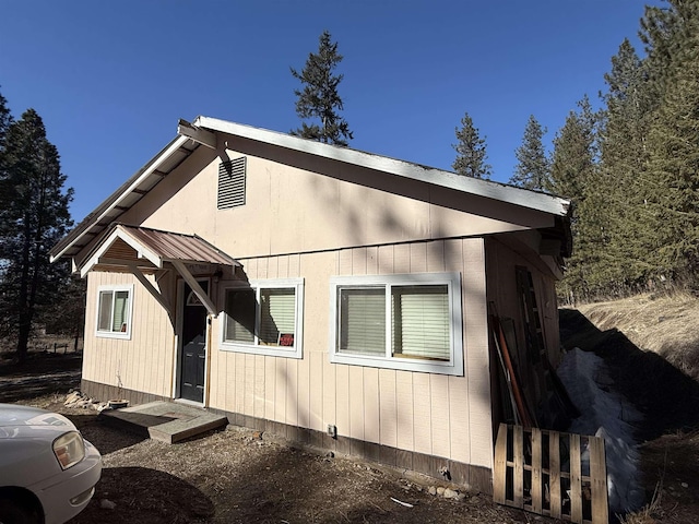 view of front of house featuring metal roof