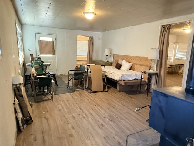 bedroom with wood finished floors