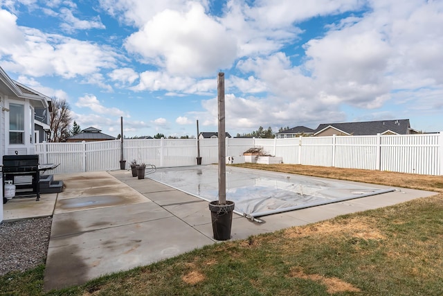 view of patio featuring a fenced backyard