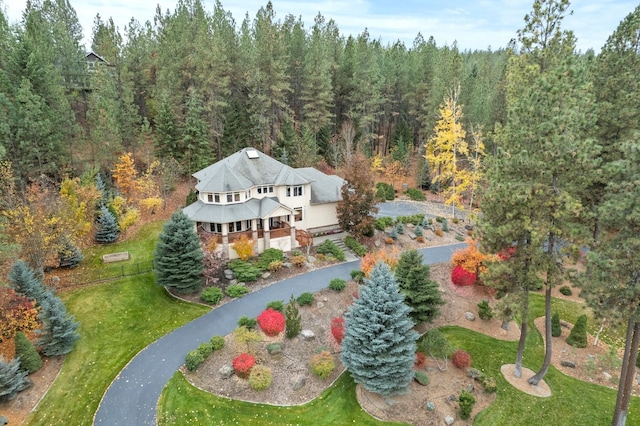 aerial view featuring a forest view