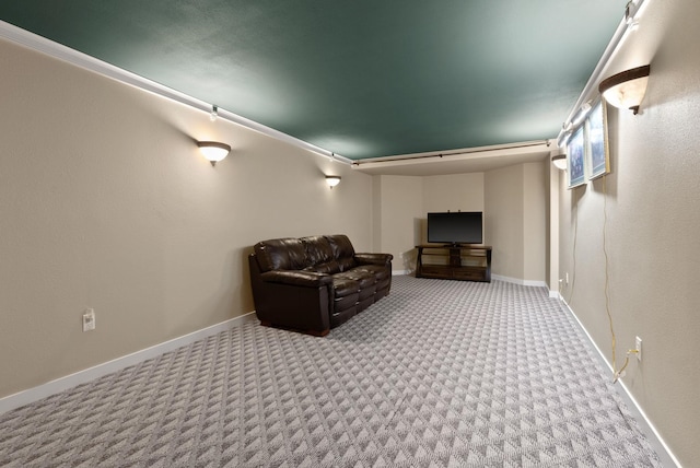 home theater with carpet flooring and baseboards