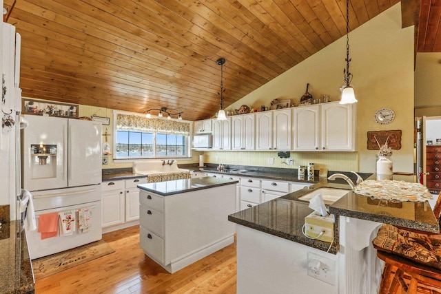 kitchen featuring light wood-style flooring, wood ceiling, white cabinets, a sink, and white appliances