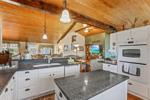 kitchen featuring wood ceiling, white appliances, white cabinetry, and a sink