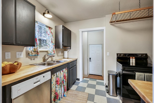 kitchen featuring electric stove, light floors, stainless steel dishwasher, wooden counters, and a sink