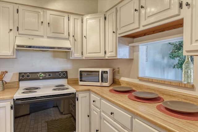 kitchen featuring range with electric cooktop, white cabinetry, under cabinet range hood, and white microwave