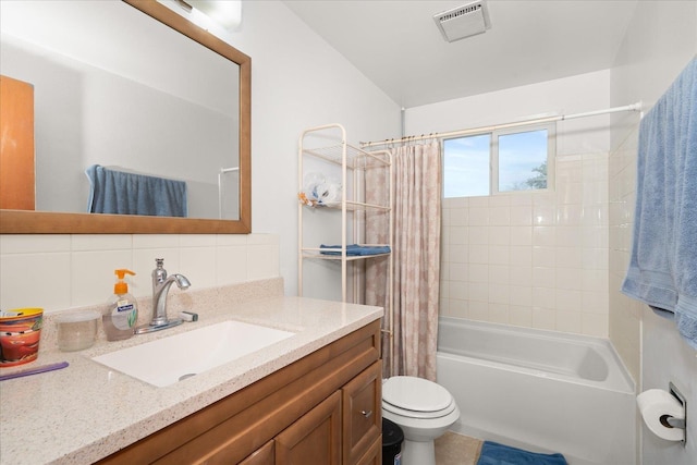 full bath featuring tasteful backsplash, visible vents, toilet, shower / bath combo with shower curtain, and vanity