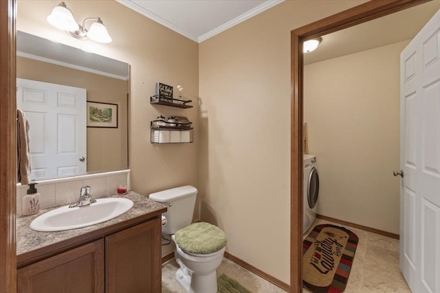 half bath with toilet, vanity, baseboards, washer / clothes dryer, and crown molding