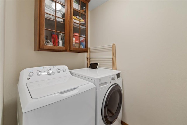 laundry area with washer and dryer