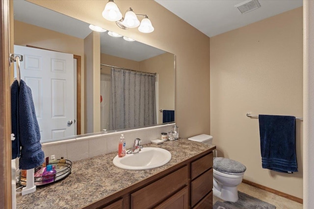 full bathroom featuring baseboards, visible vents, vanity, and toilet