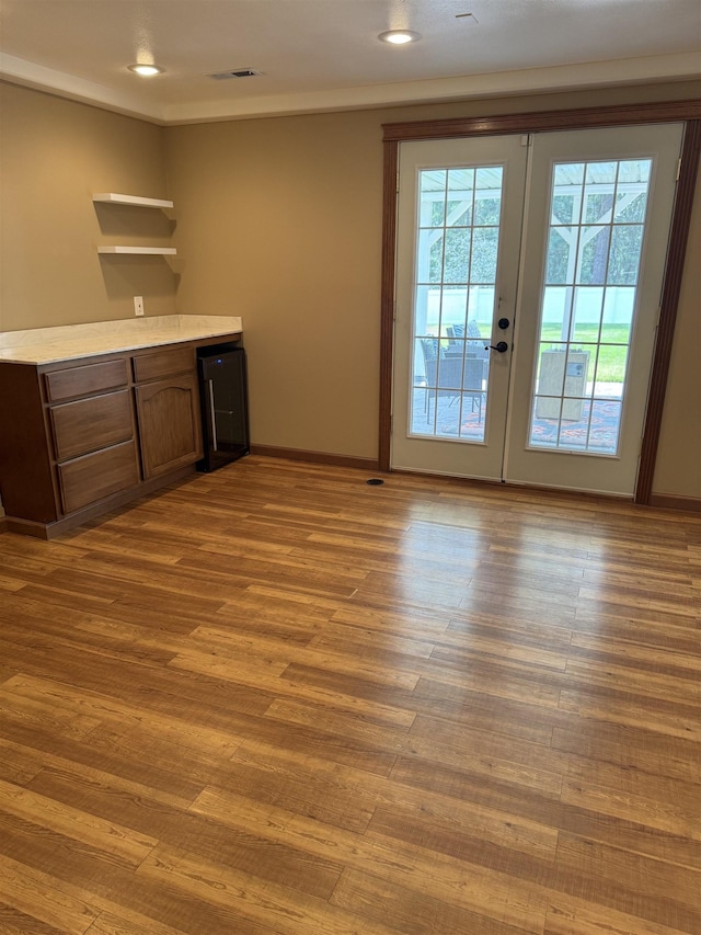 5507 N Colton Ln, Spokane, WA 99212 - bar featuring french doors, wood finished floors, and recessed lighting