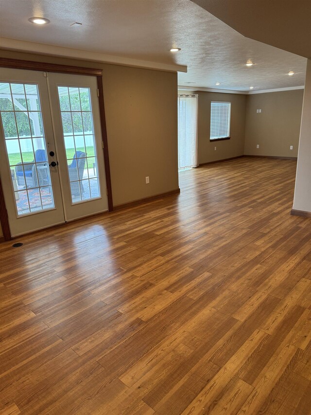 5507 N Colton Ln, Spokane, WA 99212 - unfurnished room with french doors, ornamental molding, wood finished floors, and recessed lighting