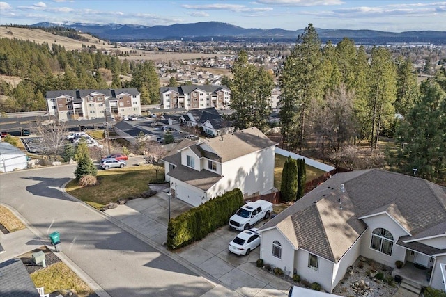 birds eye view of property featuring a residential view and a mountain view