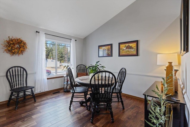 5507 N Colton Ln, Spokane, WA 99212 - dining space featuring lofted ceiling and dark wood finished floors