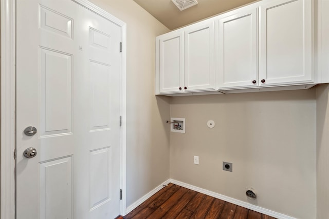 laundry area featuring hookup for a washing machine, visible vents, cabinet space, electric dryer hookup, and baseboards