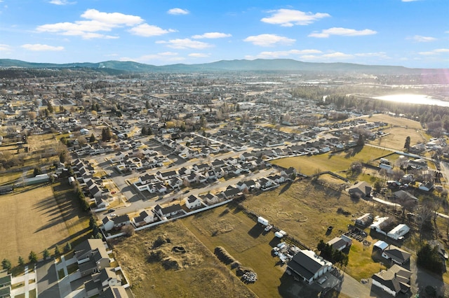 birds eye view of property with a residential view and a mountain view