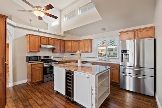 kitchen with wine cooler, open shelves, stainless steel appliances, a sink, and under cabinet range hood