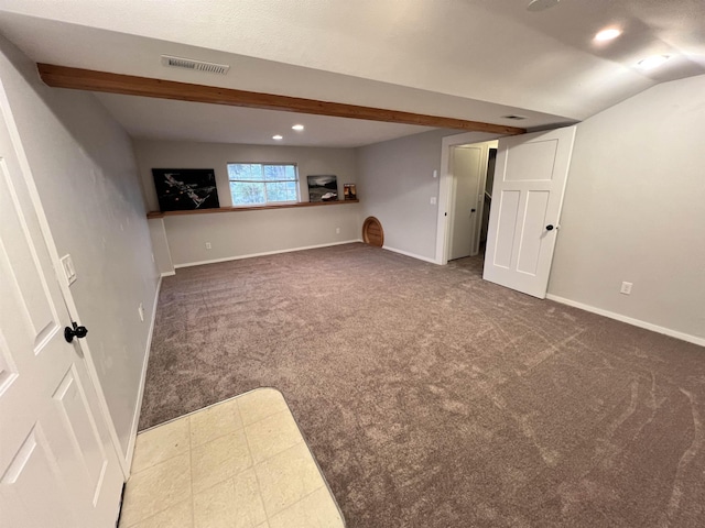 below grade area featuring carpet, visible vents, baseboards, and recessed lighting