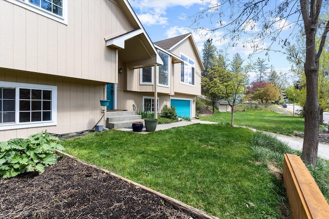 view of yard with a garage