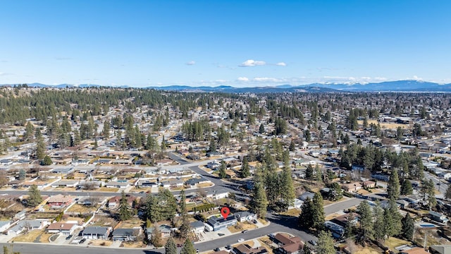 drone / aerial view with a residential view and a mountain view