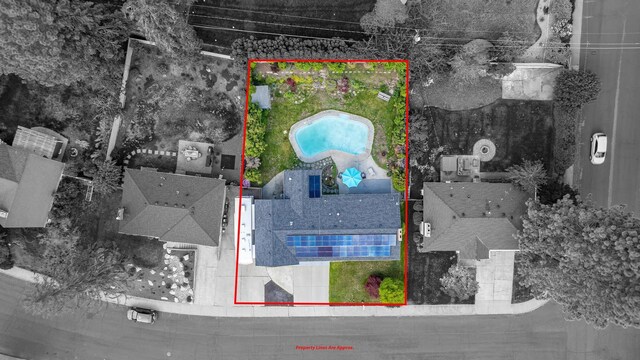 6514 N Sutherlin St, Spokane, WA 99208 - aerial overview of property's location featuring a pool and property boundaries highlighted