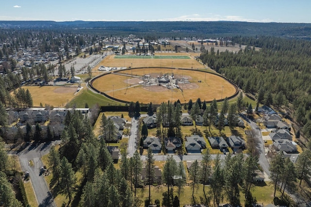 aerial view featuring a forest view