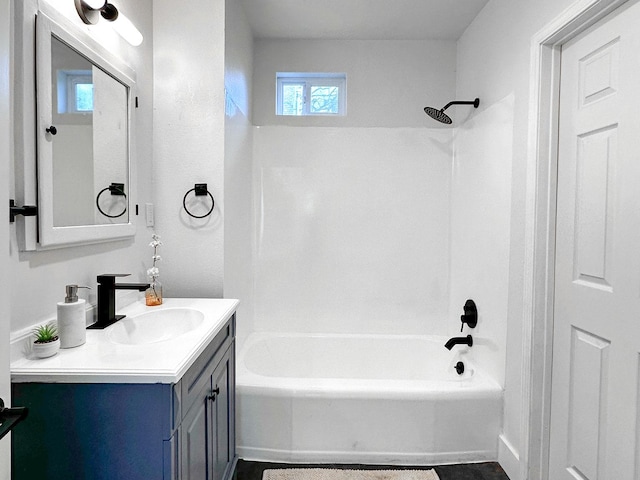 full bathroom with tub / shower combination and vanity