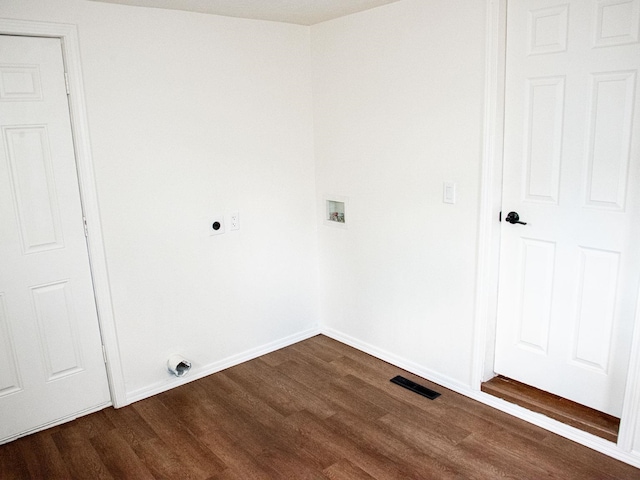 washroom with laundry area, visible vents, dark wood-type flooring, and electric dryer hookup