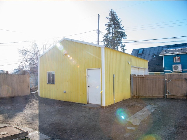 garage featuring fence