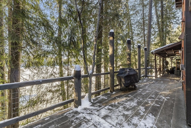 wooden deck with grilling area