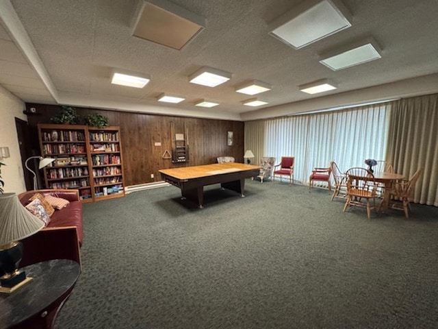 playroom featuring carpet floors and wooden walls