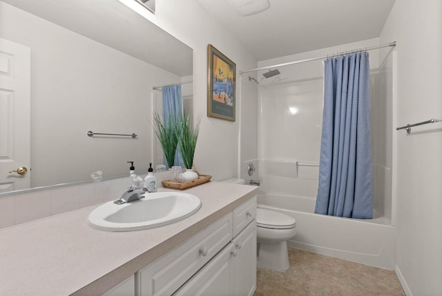 bathroom featuring toilet, vanity, and shower / tub combo with curtain