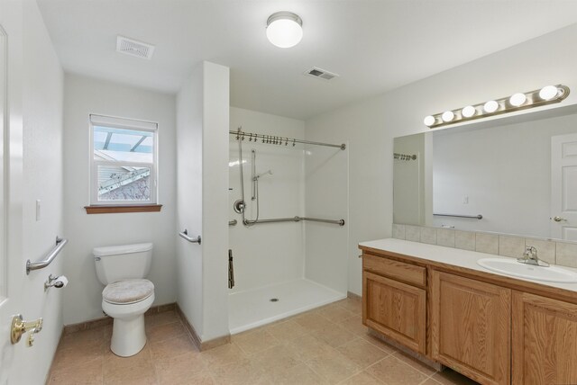 full bathroom with toilet, a shower, vanity, and visible vents