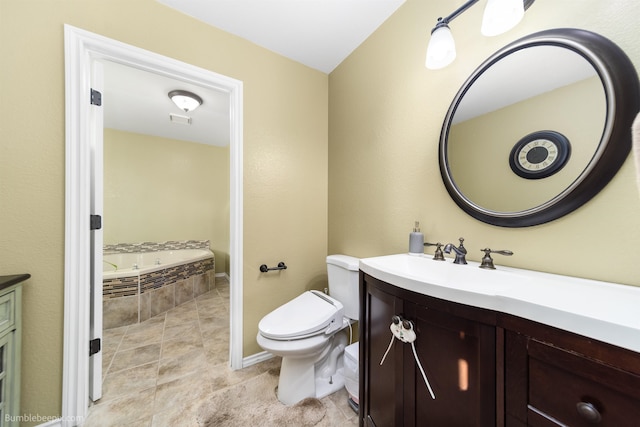 full bathroom featuring visible vents, toilet, a garden tub, tile patterned flooring, and vanity