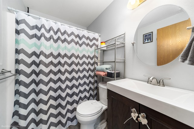 full bath featuring toilet, a shower with curtain, and vanity