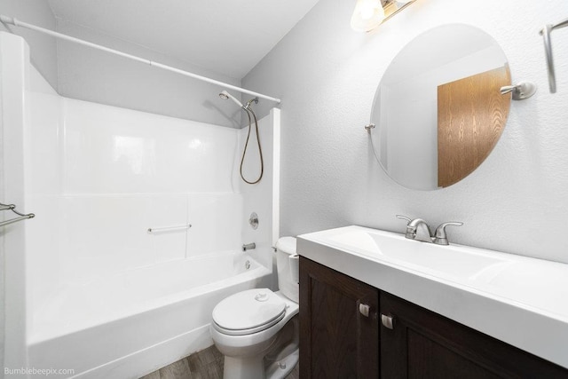 510 N Bell St, Spokane Valley, WA 99016 - full bath with wood finished floors, tub / shower combination, vanity, and toilet