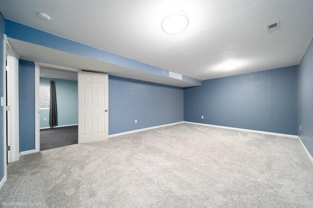 510 N Bell St, Spokane Valley, WA 99016 - basement with carpet floors, visible vents, and baseboards