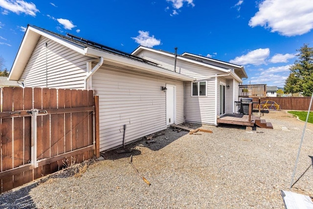 510 N Bell St, Spokane Valley, WA 99016 - rear view of property with fence and a deck