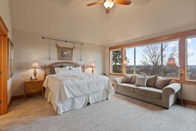 bedroom with lofted ceiling, ceiling fan, carpet flooring, and baseboards