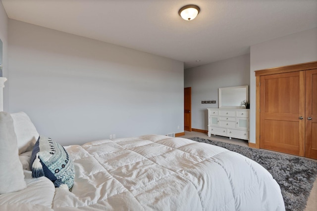 bedroom featuring baseboards