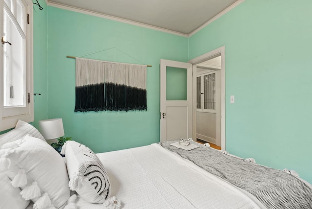 bedroom with ornamental molding