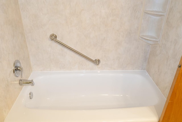 bathroom featuring a washtub