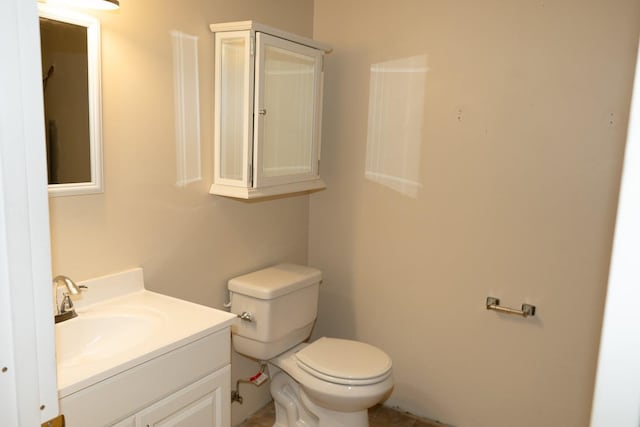 half bath with toilet and vanity