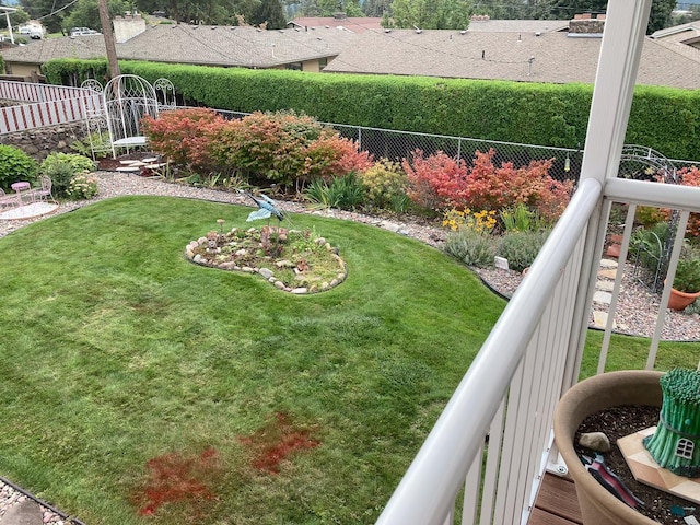 view of yard with a fenced backyard