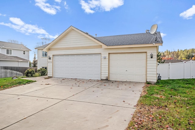 garage with fence