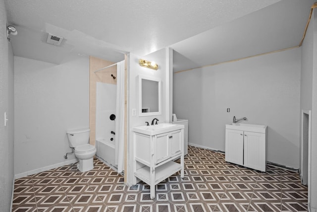 bathroom with toilet, a textured ceiling, shower / tub combination, and vanity