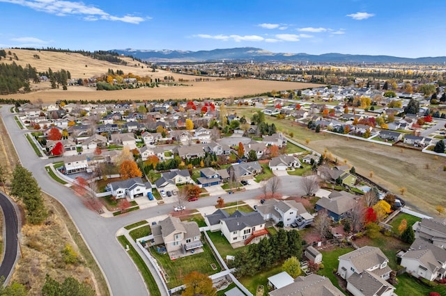 birds eye view of property with a residential view and a mountain view