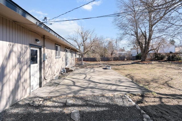 view of yard featuring a patio area and a fenced backyard