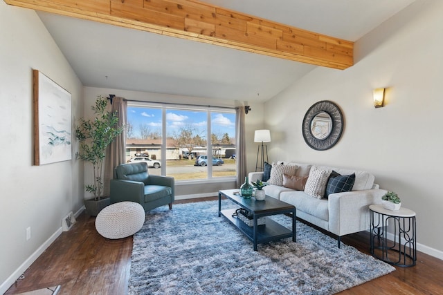 living area with vaulted ceiling with beams, visible vents, baseboards, and wood finished floors